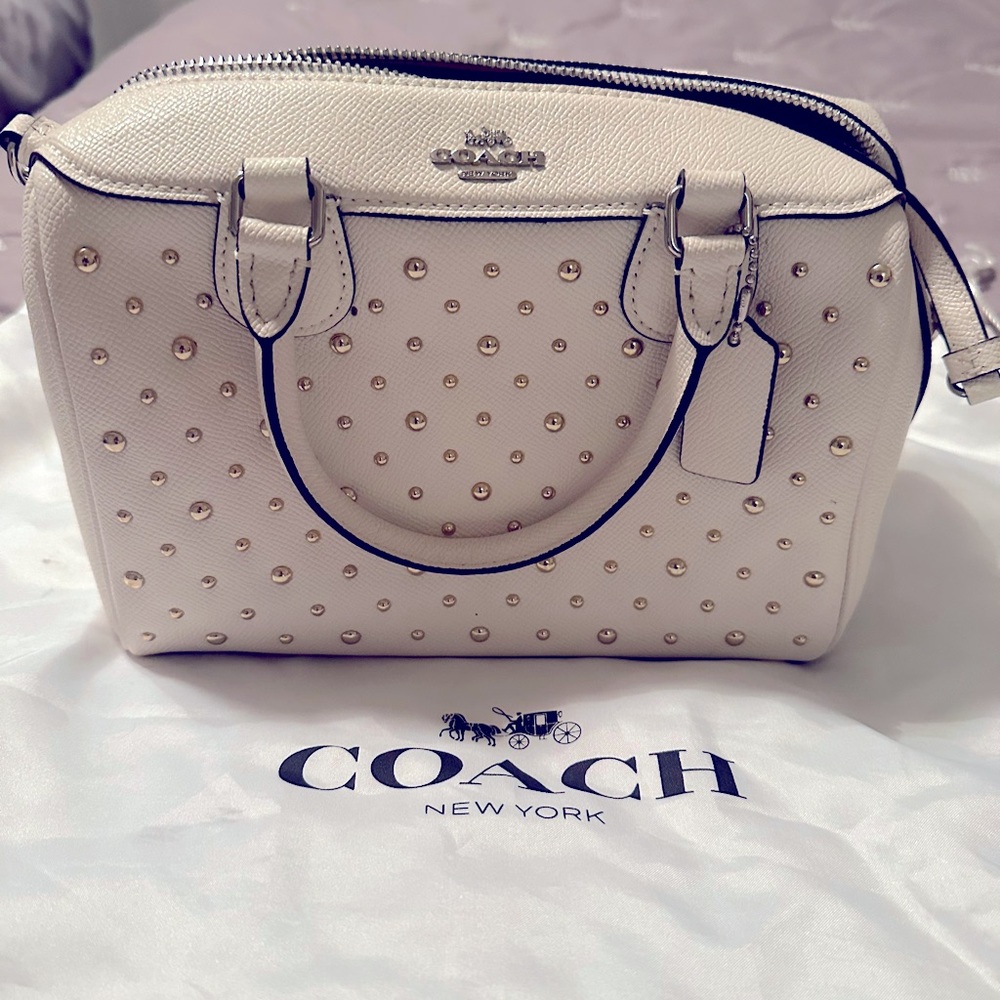 Authentic coach white bag with gold rivets. Like new used once.